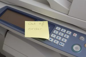 out of order sign on a copier