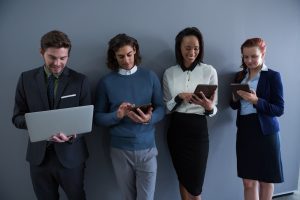 business people using different devices. endpoint security concept.